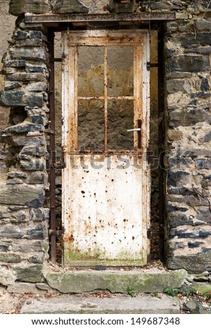 Old door in old ruin
