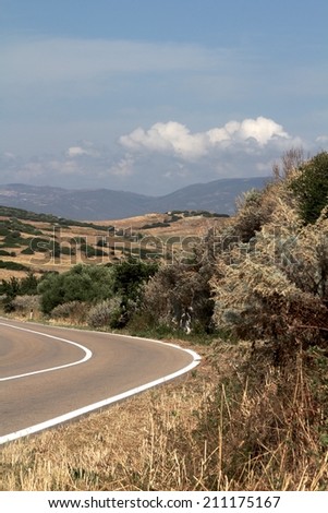 road through a mediterranean landscape