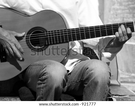 guitar street performer playing in Spain