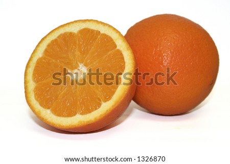 cut half orange and whole orange sit together