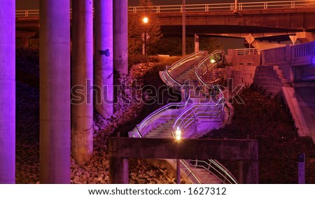 stair to the bayou lit with purple light