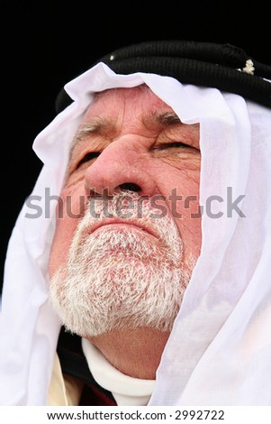 close up picture of old man in middle east wardrobe