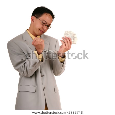 stock photo isolated business man confused why his hand is handcuffed 