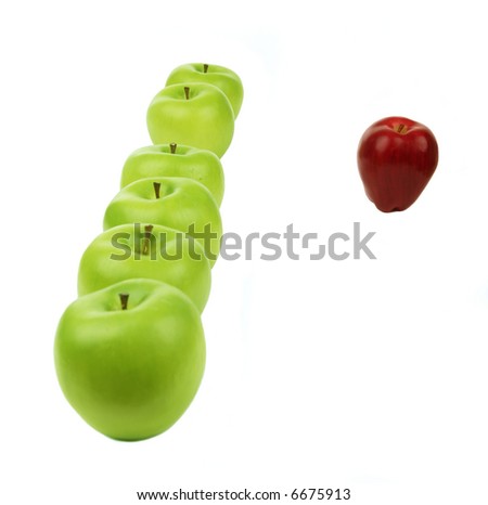a vertical line of green apples and a red apple sit in the front of them