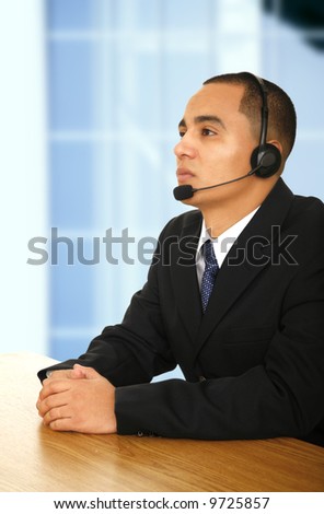 customer service representative listening to presentation or seminar in modern office environment