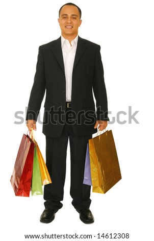 isolated shot of happy male shopper carrying shopping bags