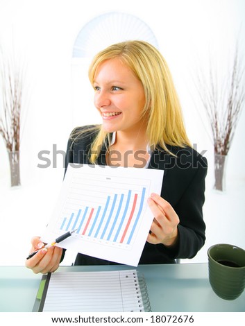 caucasian blond beautiful businesswoman presenting increasing sales chart