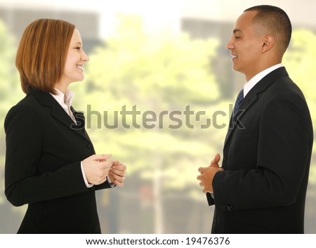 close up shot of two business people talking to each other while making gesture. concept for business dicussion