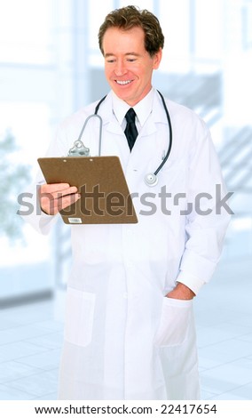 senior happy caucasian doctor reading a report in hospital area