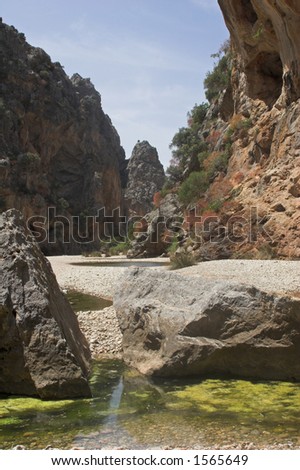 Dried river gorge between two mountains