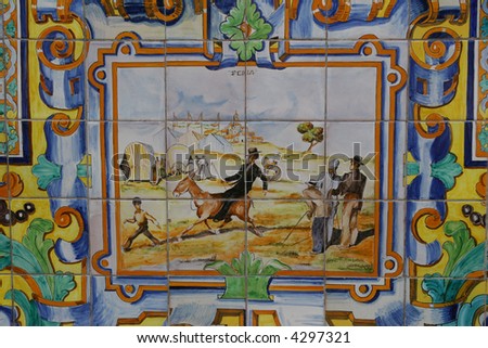 Old spanish tiled scene of man on donkey