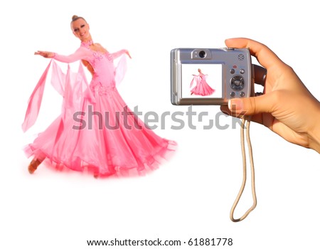 Photographing with point and shoot digital camera a beautiful young dancer