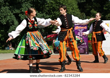 LODZ, POLAND - JULY 28: A folklore dancing group from Poland, performs during the International Folk Festivals in Lodz, on July 28, 2011 in Lodz, Poland.