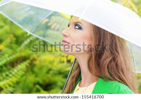 Pretty girl with transparent umbrella