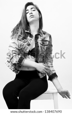 fashion female model wearing jeans jacket and black tights