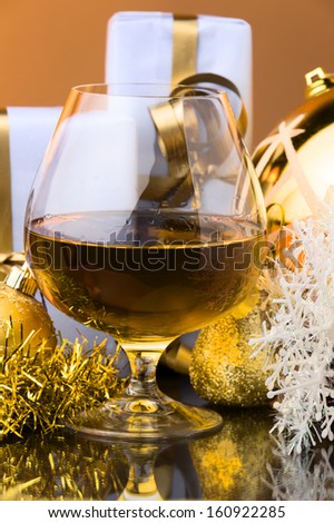 glass of whiskey Christmas decoration and gift box
