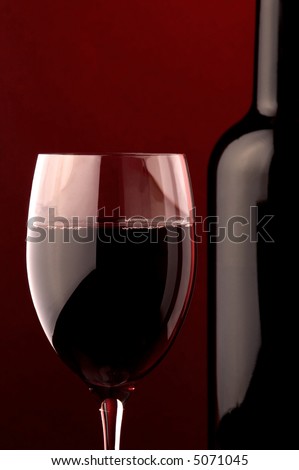 red wine glass and bottle details