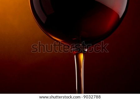 a glass with red wine detail