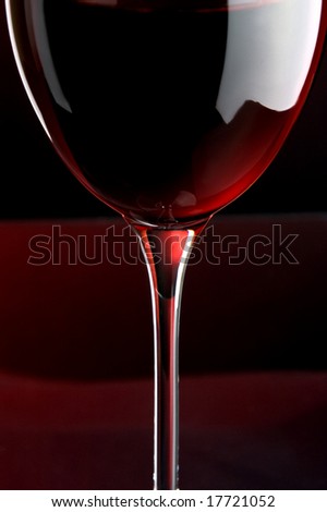 a glass of red wine details