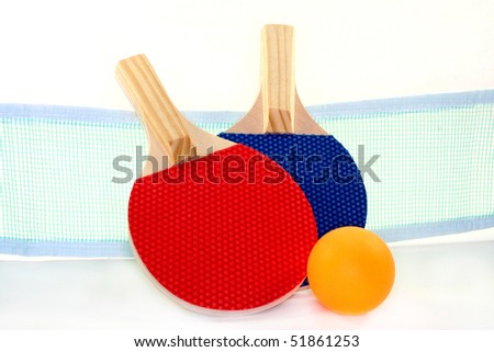 two table tennis bats, net and ball on a white background