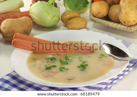 Cream of potato soup with bacon and vegetables