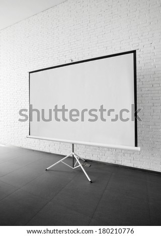 Blank projector canvas in the office