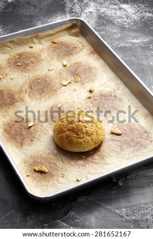 Pineapple Bread in empty plate, on the black board