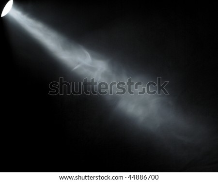 White Light Beam from Projector on Black Background