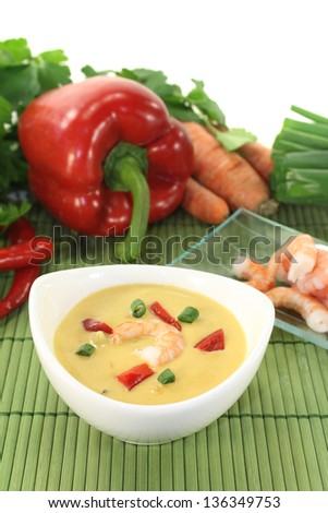 fresh Curry Soup with shrimp, bell pepper, leeks and coconut milk