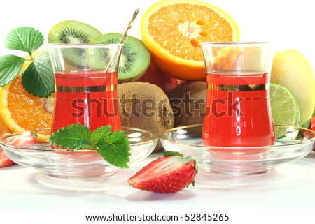 Fruit tea with fresh fruit and lemon balm