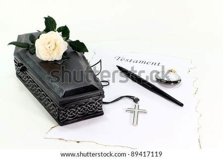 Testament with coffin, a white rose, clock, pen and cross