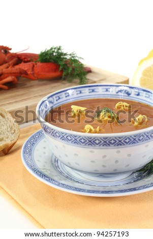 fresh Asian lobster soup with lemon, dill and bread