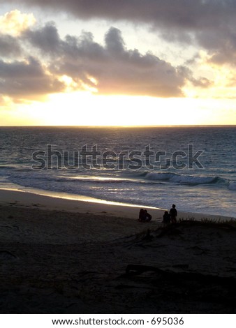 Sunrise at Hawaii Beach with Relaxing People