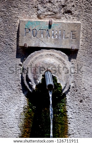 Ancient fountain with drinkable water