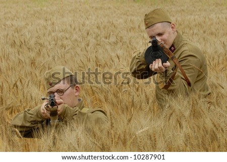 Two russian Red Army soldiers aiming rifles