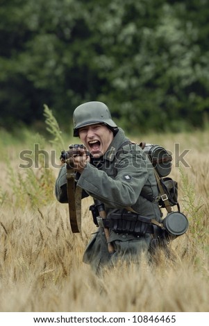 German WW2 infantery soldier with captured russian rifle, assaulting