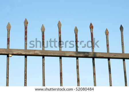 Metal forged fence protection isolated on white for background texture