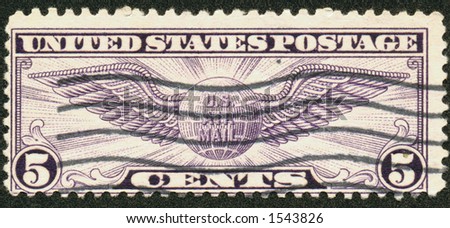 A vintage US Postage Air Mail stamp depicting wings in purple for five cents