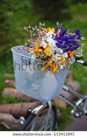 bike with a basket and flowers