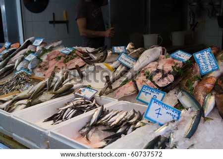 HERAKLION, GREECE - JULY 26: Fish shop in the Central Street Market in city of  Heraklion, at Crete Island, Greece on July, 26, 2010. The outdoor market has products from all over the prefecture.
