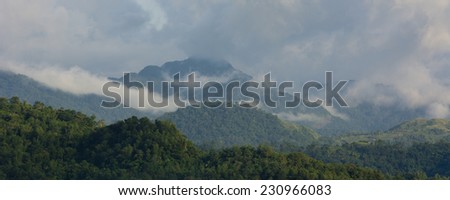 Clouds rolling in over high mountains on Panay island in the Philippines