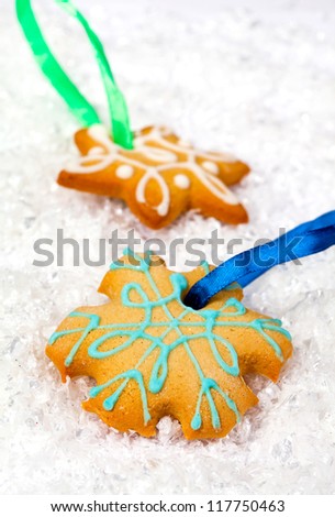 Tasty  gingerbreads snowflakes for dessert on a holiday and Christmas decor