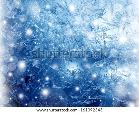 Frosty winter pattern at a window glass, macro texture