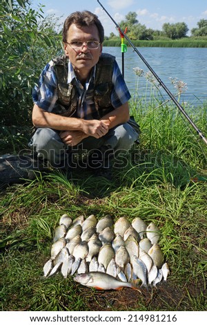 Morning fishing on river Chagan in Kazakhstan, crucian (river carp)