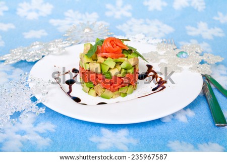 Tasty salad  - appetizer on a holiday and Christmas decor