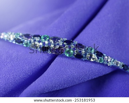 Luxury jewelry on velvet background close up