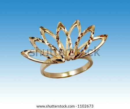 Golden ring  in form fan with diamond lapping on blue heavens