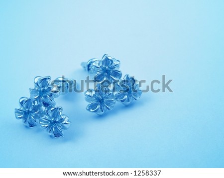 Blue background with jewelry