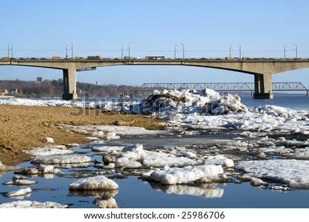 Bridge . Spring.  Drifting Ice on river Volga.