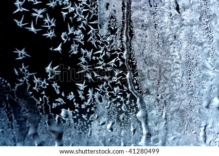 Frosty original  pattern on window glass. Winter